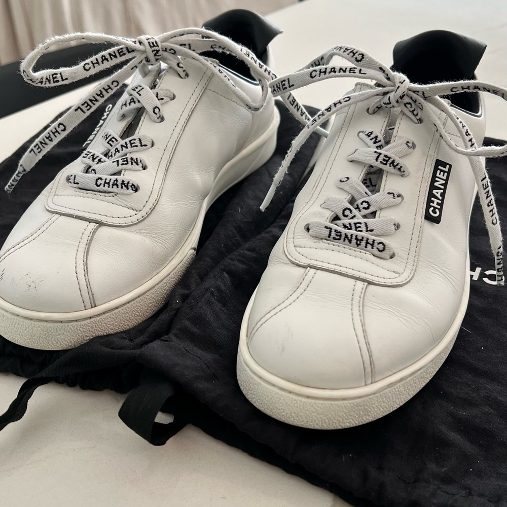 Chanel white leather logo lace sneakers